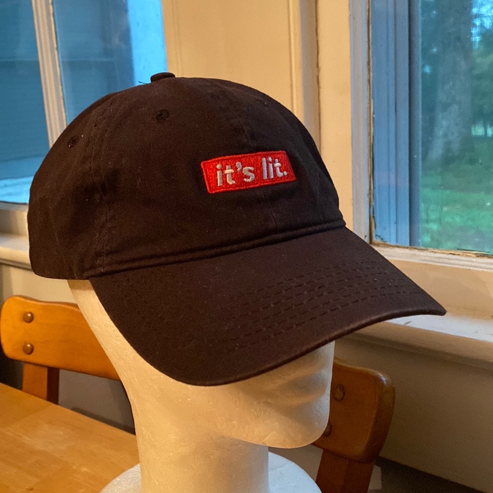 It’s lit. Artist collective baseball style hat in good condition
